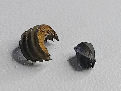 The resideues of the bolt and the extractor removed